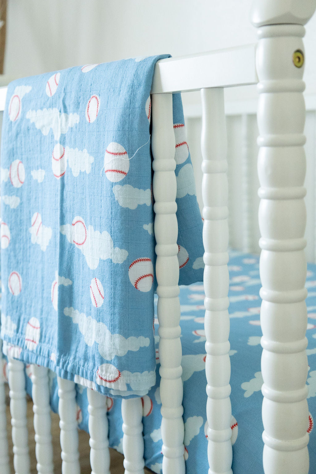Organic Bamboo Cotton Muslin Crib Sheet in Baseballs in the Sky