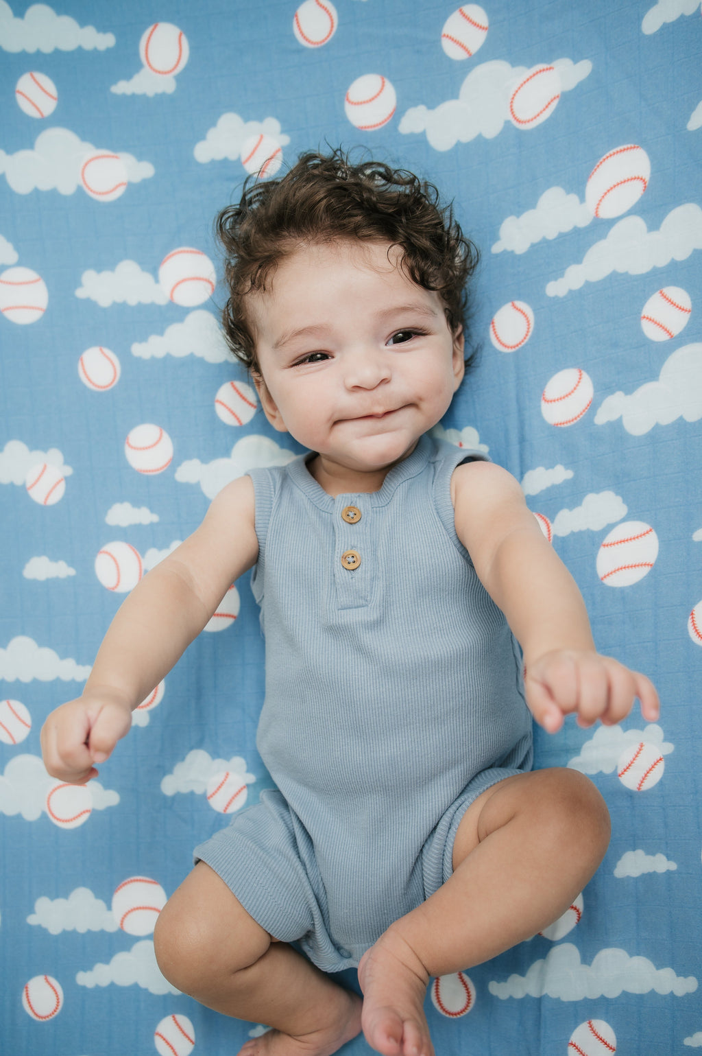 Organic Bamboo Cotton Muslin Crib Sheet in Baseballs in the Sky